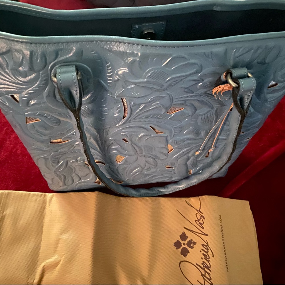 Lovely Patricia Nash Blue with Silver detail and beautiful suede lining.